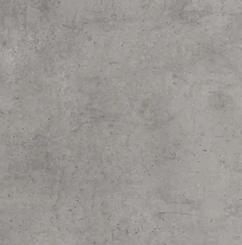 a gray concrete wall with a black and white clock on it